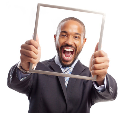 young cool black man shouting on steel frameの写真素材