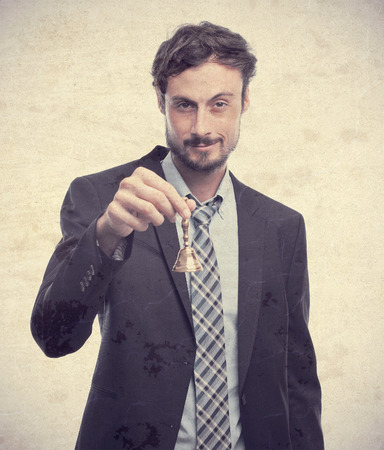young crazy businessman with a bellの写真素材
