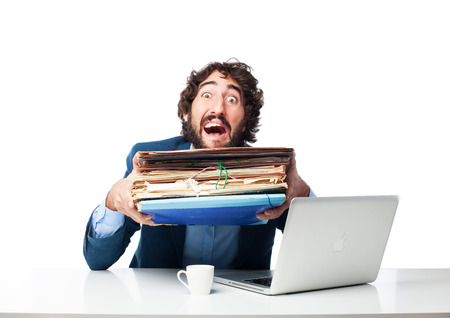 stressed businessman with filesの写真素材