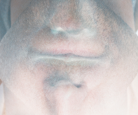 blond man and blue eyes close upの写真素材