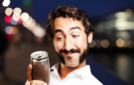 young cool man with a beerの写真素材