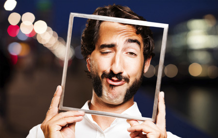 young cool man with a frame
