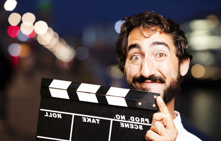 young cool man with a clapperの写真素材