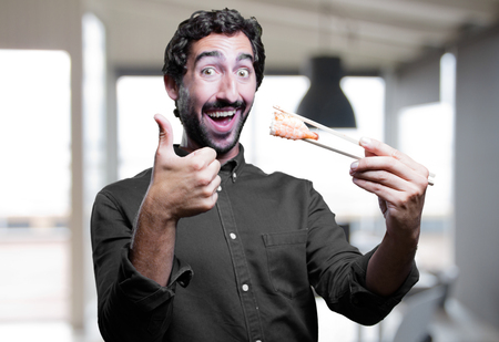 young man eating sushi. all right conceptの写真素材