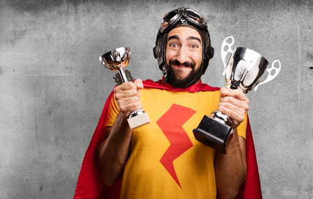 crazy super hero with sport cupの写真素材