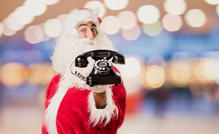 santa claus with vintage phoneの写真素材