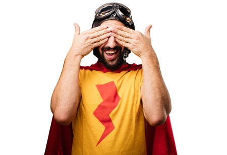 crazy super hero covering eyes gestureの写真素材