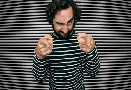 young crazy man and stripped optical effectの写真素材