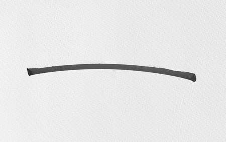 black ink shape on watercolor paper textureの写真素材