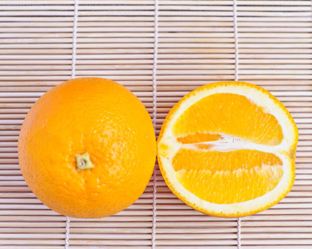 Fresh orange fruit on wooden backgroundの写真素材