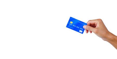 hand holding a blue credit card on white background . shopping on line for buy-sell with e-commerce technology.の写真素材