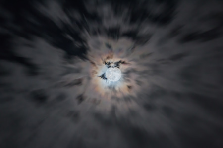 Break through the clouds towards Moon.の写真素材