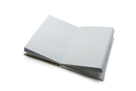 The white book opens the middle page on a white background.isolatedの写真素材