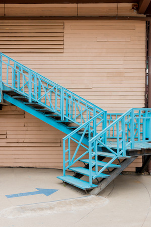 Retro style wooden staircase outside the building.の写真素材