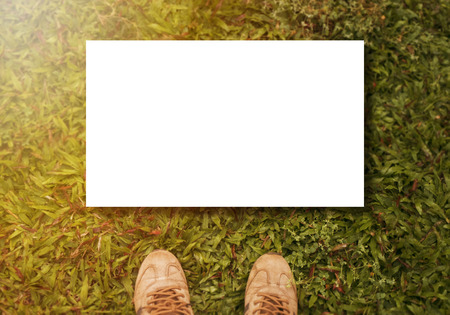 Shoes on grass and free spaceの写真素材