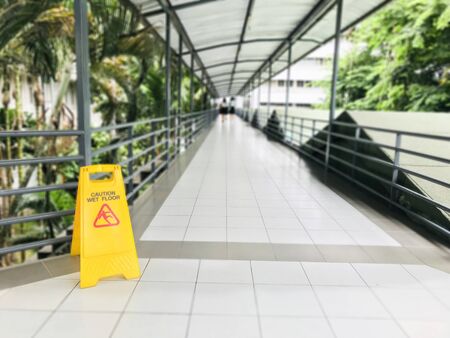 Warning sign to be careful to on slip work wayの写真素材