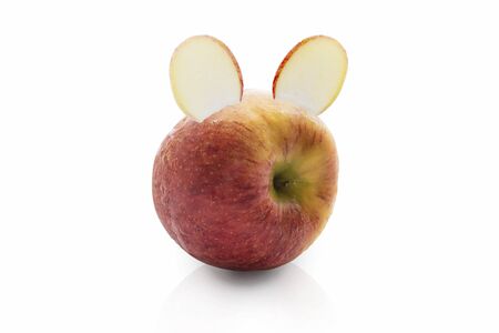 Apples like rabbits on white background.の写真素材