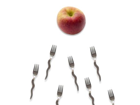 concept apple and  forks on white background.の写真素材