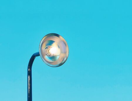 modern lamp on blue skey backgroundの写真素材