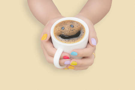 froth milk foam smiles in a cup of coffeeの写真素材
