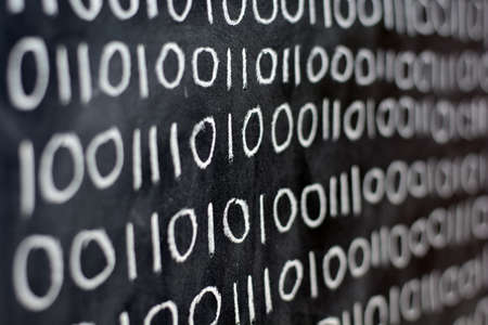 The numbers zero and one, written on a blackboard, binary system