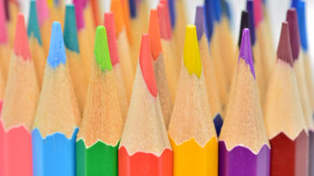 Details of colored pencil tips, isolated on white background