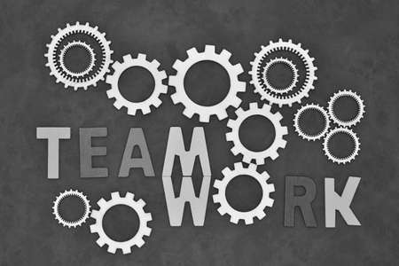 Cog gear wheels on different color backgrounds, teamworkの写真素材