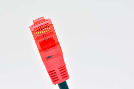 Red ADSL connector cable, isolated on whiteの写真素材