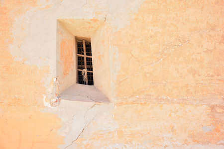 Different windows in old facades of a medieval town