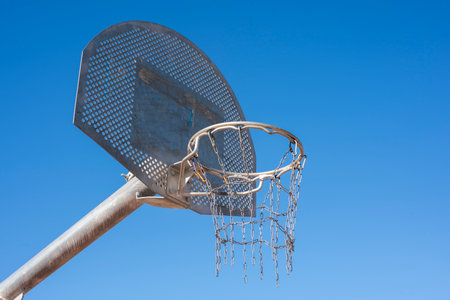 Basketball basket with backboard and metal netの写真素材