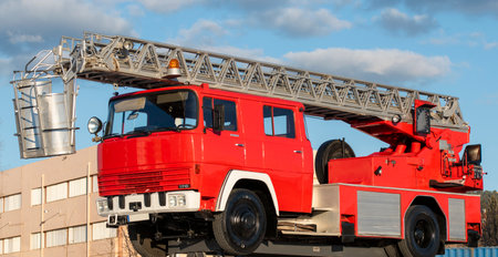 Classic fire truck outdoors with sky in the backgroundの写真素材