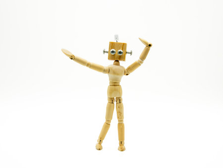 Small original mannequin robot, made with wood and screws, isolated on whiteの写真素材