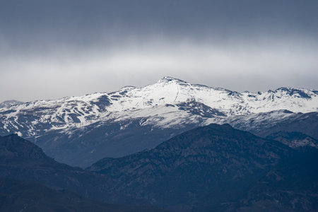 The Veleta peak standing out among the Sierra Nevada mountains in Granada, Spainの写真素材