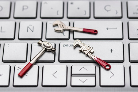 Miniature tools on a computer keyboard for repair purposes
