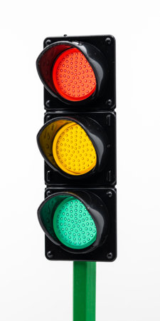 Traffic light with the colors red, yellow, and green, isolated on white