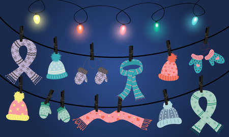 Winter Collection of scarves, hats and mittens hanging on clothespins and a shining garland. Christmas greeting card.のイラスト素材