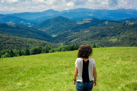 Girl in mountainsの写真素材
