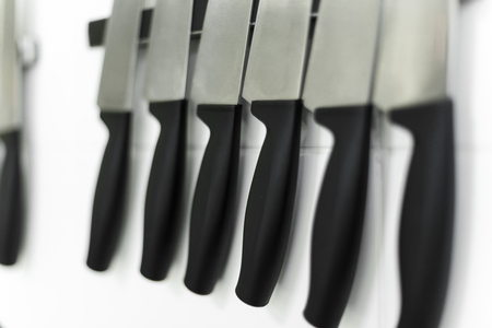 knifes set on the kitchen wallの写真素材