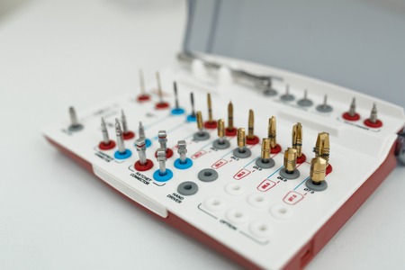 dental prosthetics tools kit on white background.の写真素材