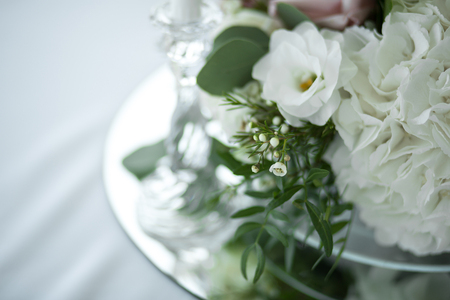 Closeup fresh white roses decoration table decoration. wedding decor.の写真素材