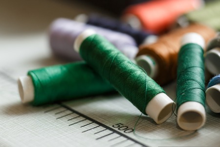 closeup set of skeins of multi-colored sewing thread.Tailor industry.の写真素材