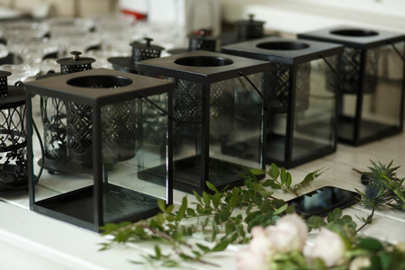 black metal and glass Candle holder Event decor. Wedding banquet design.の写真素材
