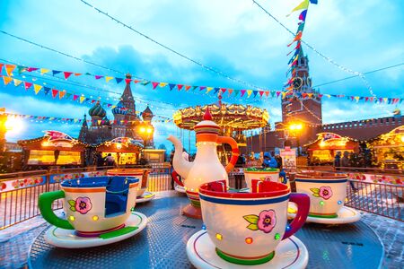 Celebration of the New Year and Christmas on the Red Square in the center of Moscow. Holiday fair and amusement park near the Kremlin.のeditorial素材