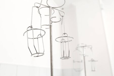 stands with a holder for drip infusion.