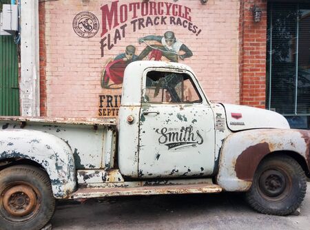 Old rusty pickup abandoned on the street.のeditorial素材