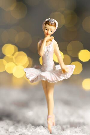 Decoration for the Christmas tree, a small figurine of a ballerina in a white tutuの写真素材