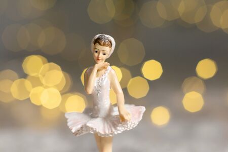 Decoration for the Christmas tree, a small figurine of a ballerina in a white tutuの写真素材