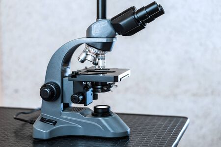 modern portable microscope in the laboratory.