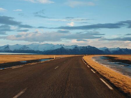 Picturesque winter landscape of Iceland. The perfect road to perspective.の写真素材
