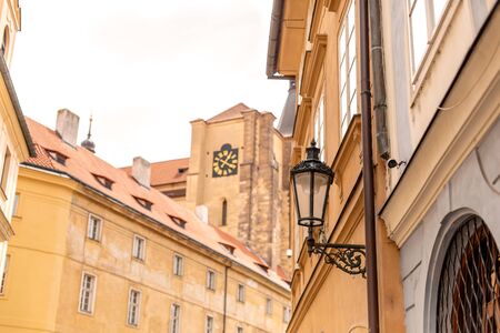 The architecture of the old city of Prague. Retro gothic street lamp for street lighting. Photo in the afternoonの写真素材
